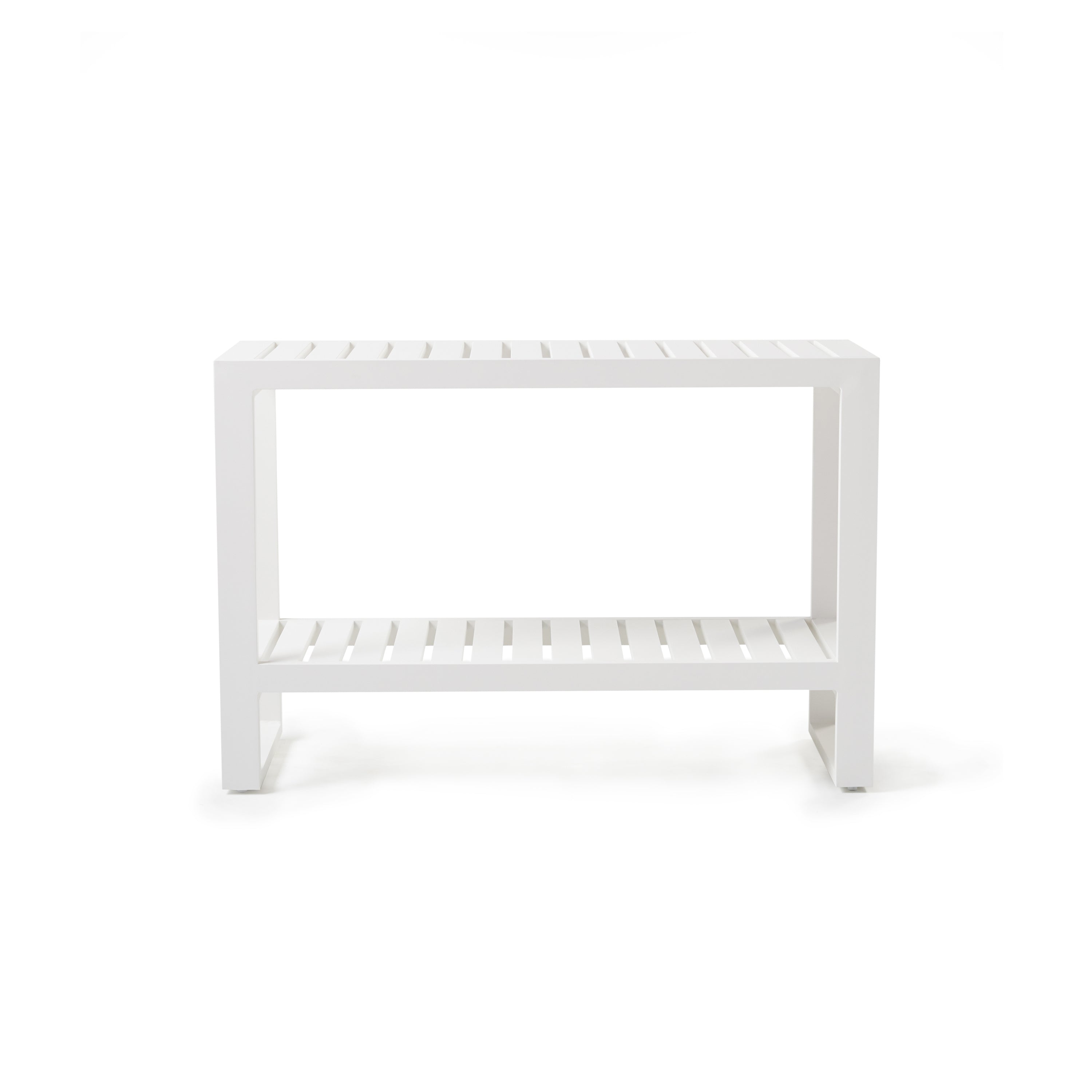 Belvedere Console Table in White by Terra Outdoor Living, crafted from durable aluminum with a crisp, modern feel, features clean architectural lines and a sled-style design that creates an elevated serving area against a wall or behind a sofa. Two-tier design allows for serving on the top surface and storage below.