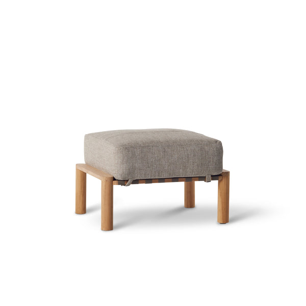 Aptos Ottoman by Terra Outdoor Living — crafted from premium plantation-grown teak, featuring a European-inspired compact silhouette; includes one weather-friendly olefin cushion that offers the perfect balance of softness and support, ideal as a footrest or extra seating, and perfect for pairing with Aptos seating components for a customized configuration.