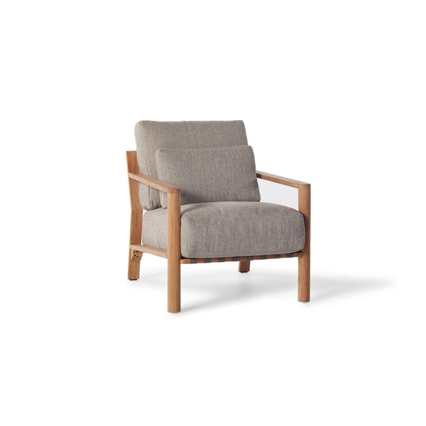 Aptos Lounge Chair by Terra Outdoor Living — crafted from premium plantation-grown teak, featuring a European-inspired compact silhouette and angled back for maximum comfort; includes one seat cushion, one back cushion, and one lumbar pillow in weather-friendly olefin, offering a perfect combination of softness and support, ideal for pairing with other Aptos seating components for a customized configuration.
