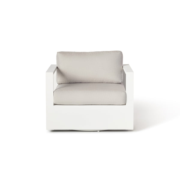 Belvedere Swivel Lounge Chair by Terra Outdoor Living, featuring a architectural white aluminum frame with a durable swiveling base and thick cushions, designed for deep comfort and effortless relaxation in an airy, modern style.