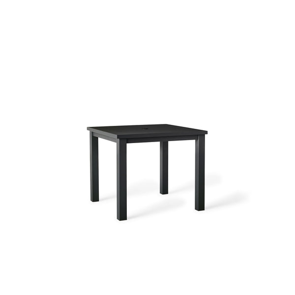Belvedere Square Dining Table by Terra Outdoor Living in Charcoal, shown with a slatted aluminum top and central umbrella hole, featuring a clean-lined, modern silhouette in a compact size for versatile outdoor placement. 