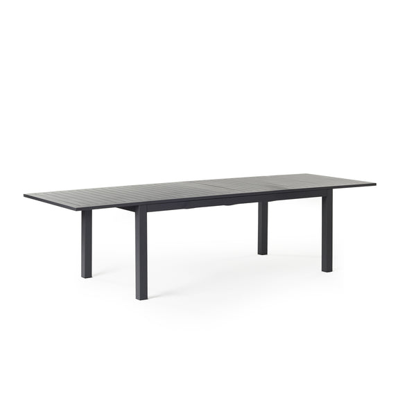 Belvedere Extension Dining Table in Charcoal by Terra Outdoor Living, crafted from durable aluminum with a sleek, modern design, featuring clean architectural lines, an airy silhouette, and built-in extension leaves for versatile outdoor entertaining. Shown at full extension to seat up to 10.
