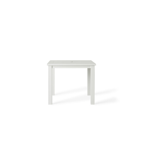 Belvedere Square Dining Table by Terra Outdoor Living in White, shown with a slatted aluminum top and central umbrella hole, featuring a clean-lined, modern silhouette in a compact size for versatile outdoor placement.