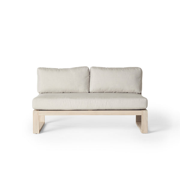 Belvedere Sectional Armless Loveseat by Terra Outdoor Living, shown in Weathered Teak with plush cushions, featuring a low-profile teak frame and deep seating for relaxed outdoor lounging. Armless design allows for modular configurations with the Belvedere Sectional pieces.