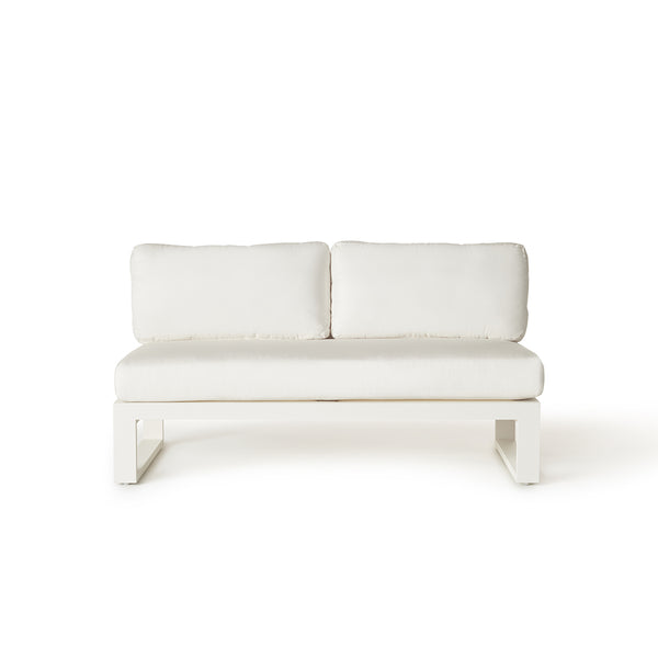 Belvedere Sectional Armless Loveseat by Terra Outdoor Living, shown in White Aluminum with plush cushions, featuring a low-profile teak frame and deep seating for relaxed outdoor lounging. Armless design allows for modular configurations with the Belvedere Sectional pieces.