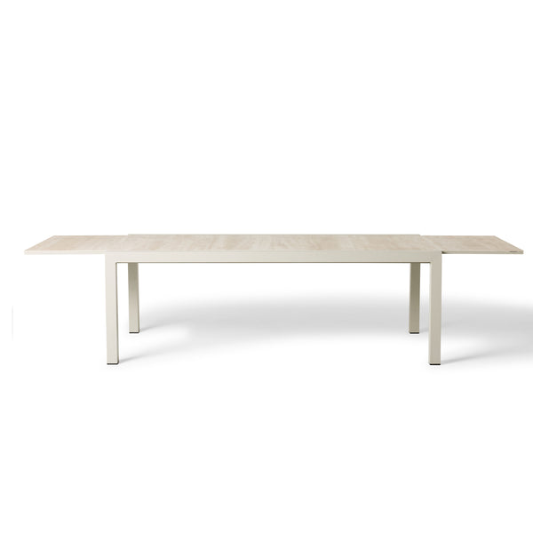 Del Mar Dining Table by Terra Outdoor Living — features an aluminum frame in 'Dune' with a ceramic top; seats up to 12 comfortably and includes a convenient extendable leaf that nests under the table when not in use, perfect for dining and entertaining.