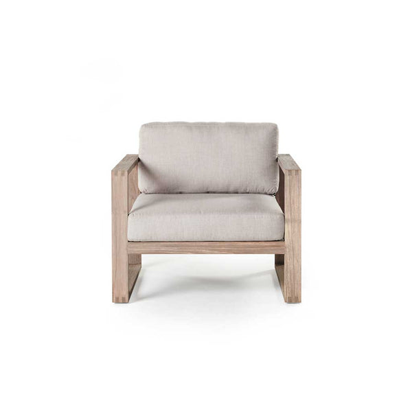 Belvedere Lounge Chair in White by Terra Outdoor Living features architectural lines, airy proportions, and deep weather-friendly cushions on a low-profile, solid premium teak frame with mortise and tenon joinery—designed for relaxed outdoor living. Features squared-off arms wide enough to rest a drink on.
