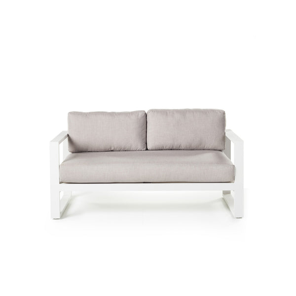 Belvedere Loveseat in Charcoal by Terra Outdoor Living features architectural lines, airy proportions, and deep weather-friendly cushions on a low-profile, durably finished aluminum frame with slatted detailing for drainage. Features squared-off arms wide enough to rest a drink on. One long seat cushion plus two back cushions complete a clean look. 